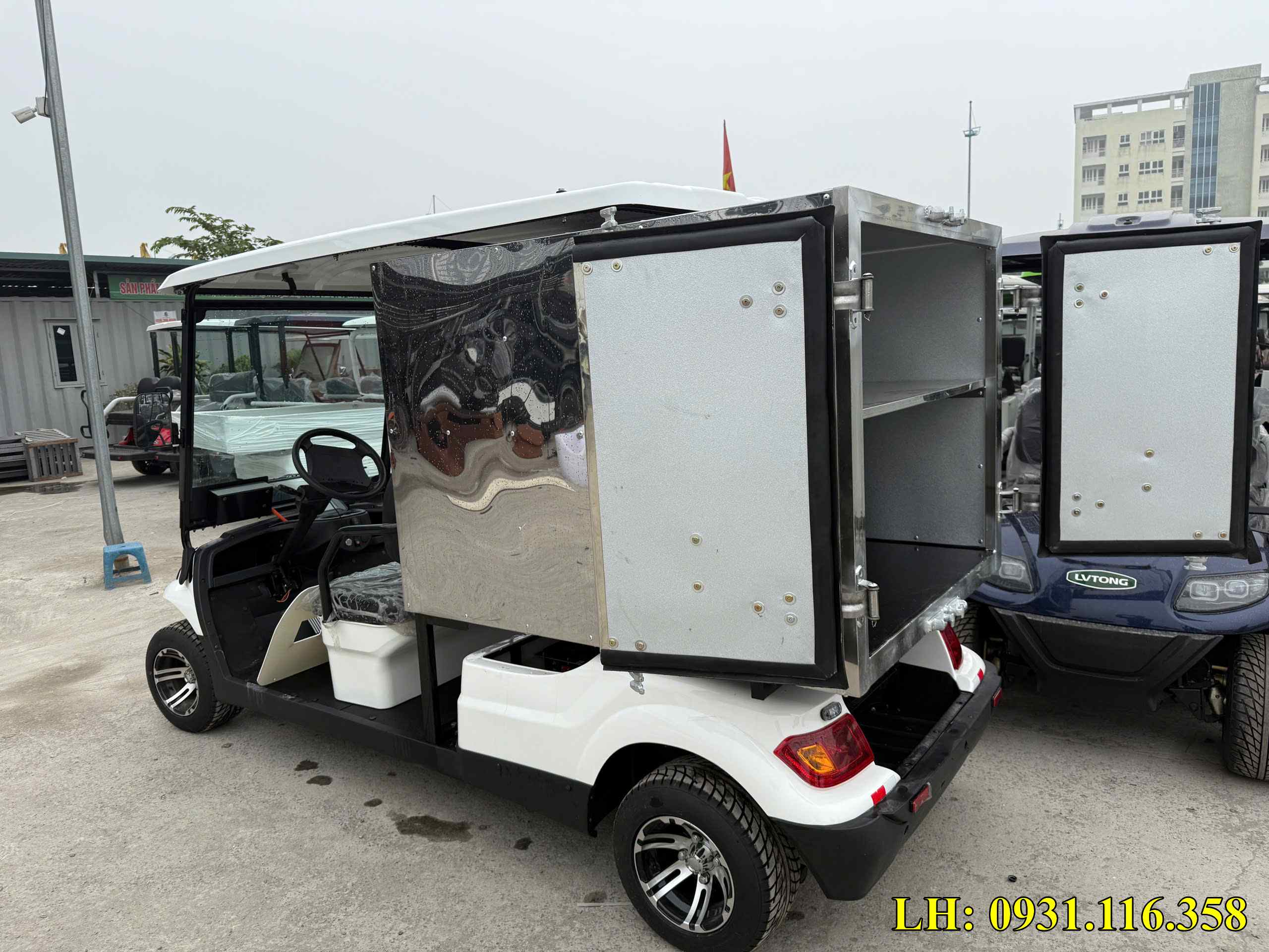 xe điện chở hàng thúng kín